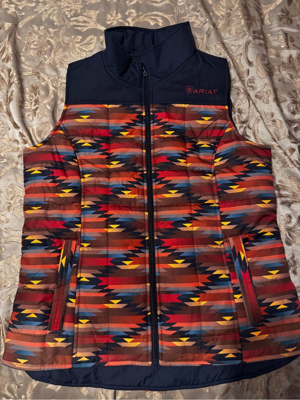 Ariat women’s Multi-Color Printed Puffer Vest - Navy Trim